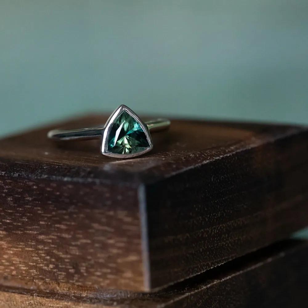 1.57ct Trillion Deep Teal Green Sapphire Contemporary Bezel Set Ring in 18k White Gold