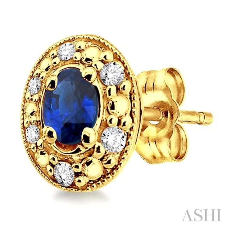 4x3mm Oval Shaped Sapphire and 1/10 Ctw Single Cut Diamond Earrings in 14K Yellow Gold